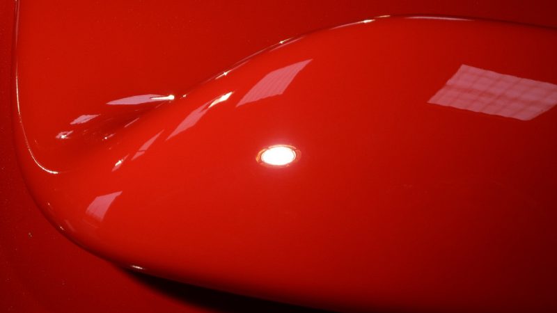 Deck lid cover after machine polishing, reflection sharp and free of trails