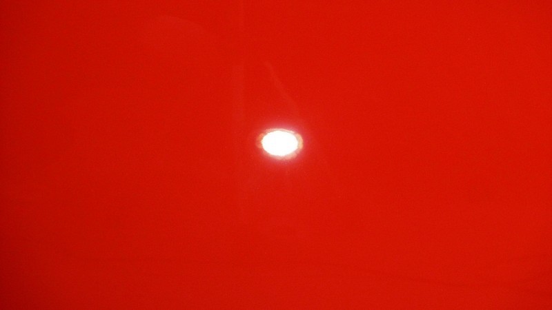 The same rear deck lid after correction, the red deep rather than hazy
