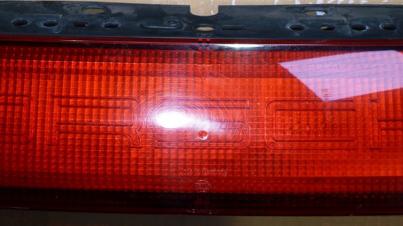 Porsche rear light bar on the 993 C4S before the lenses were polished