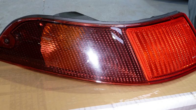 Porsche 993 rear light cluster removed from the car for correction