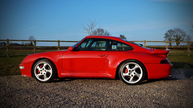 Side profile of the finished Guards Red Porsche 993 Carrera 4S