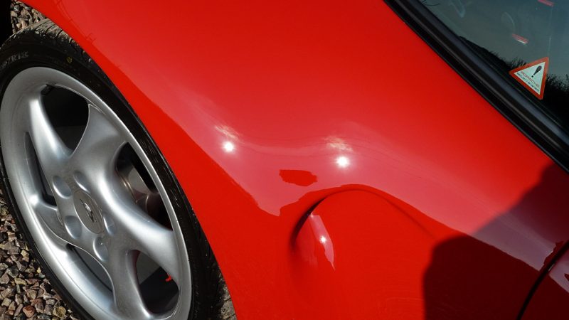 Cup wheel sealed with Swissvax Autobahn beside the polished rear arch