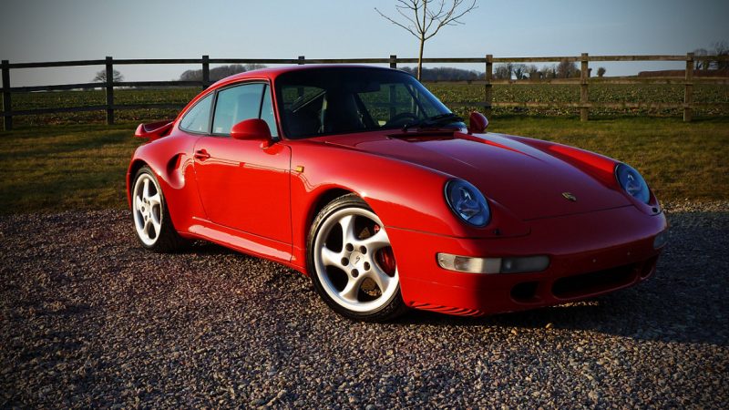 Front three quarter of the Porsche 993 Carrera 4S in low winter sun