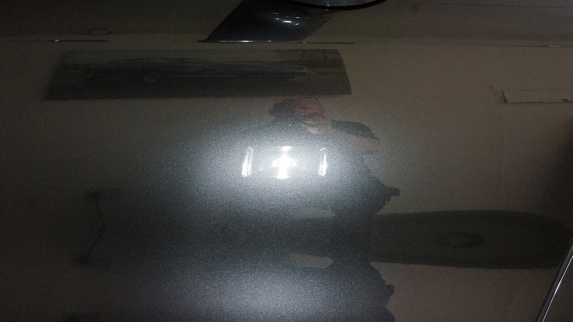 Clean reflection in BMW i8 paintwork after preparation and coating