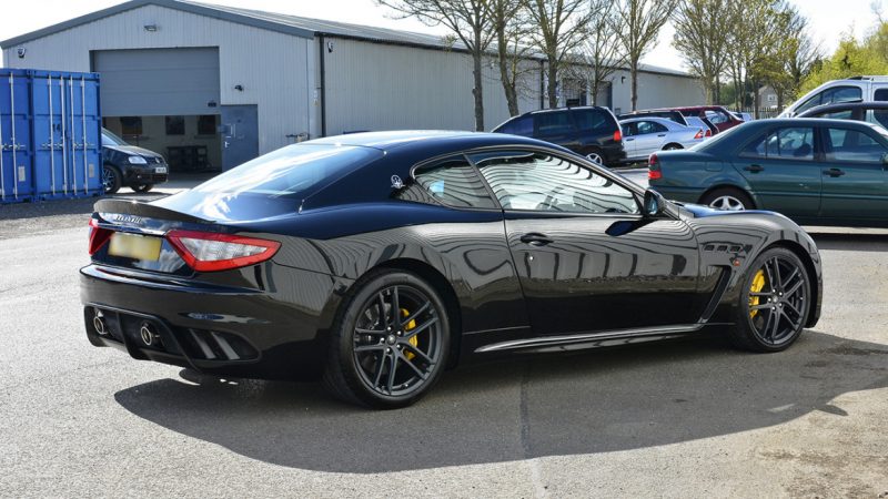 Rear three-quarter of the Maserati GranTurismo MC Stradale after detailing