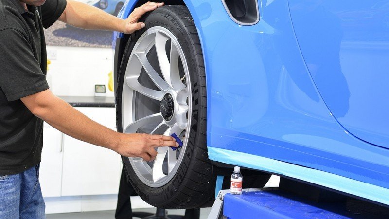 Gtechniq C5 Alloy Wheel Armour applied to a GT3 RS wheel and yellow caliper