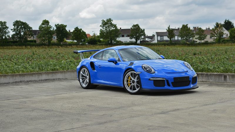 Voodoo Blue Porsche 991 GT3 RS against the Wiltshire countryside