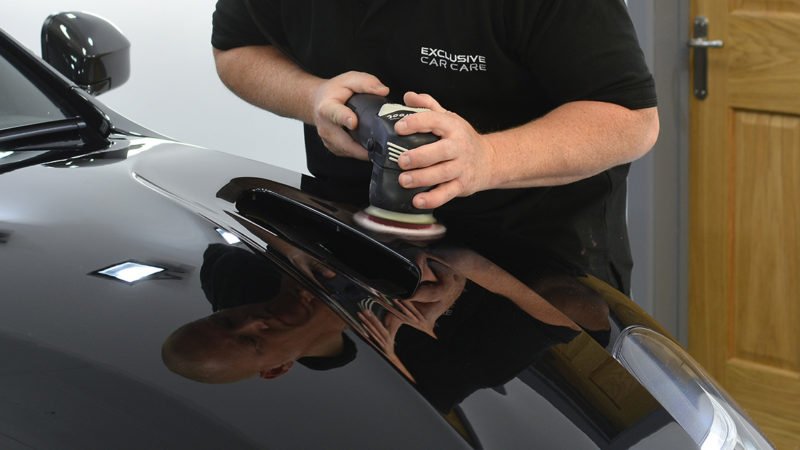 Machine polishing the Vanquish bodywork with a dual action polisher