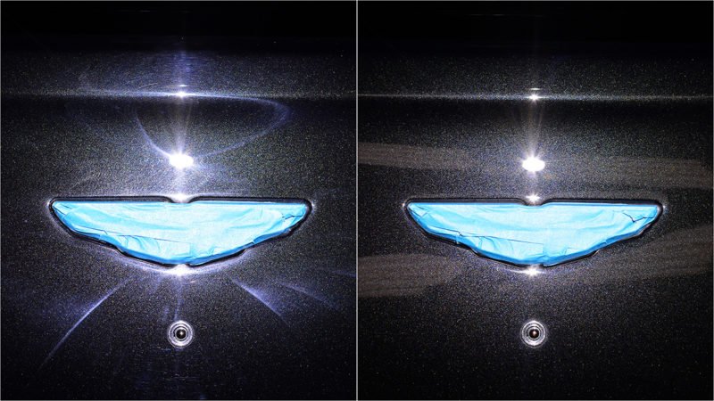 Paint around the Aston Martin badge before and after correction
