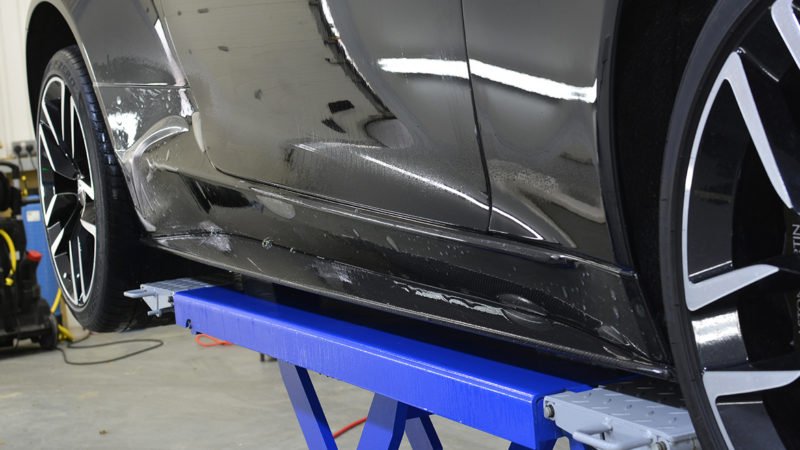 Side skirt of the Vanquish covered in paint protection film