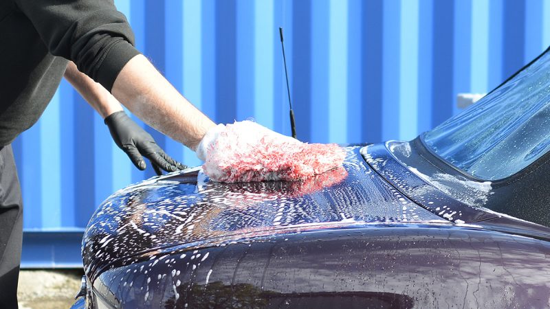 BMW Z3 bonnet washed by hand with a wash mitt to avoid marring the paint