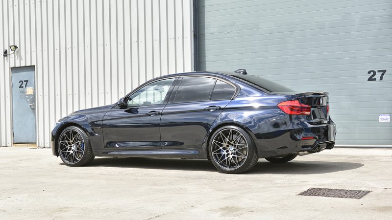 Azurite Black BMW M3 F80 in sunlight after machine polishing and ceramic coating