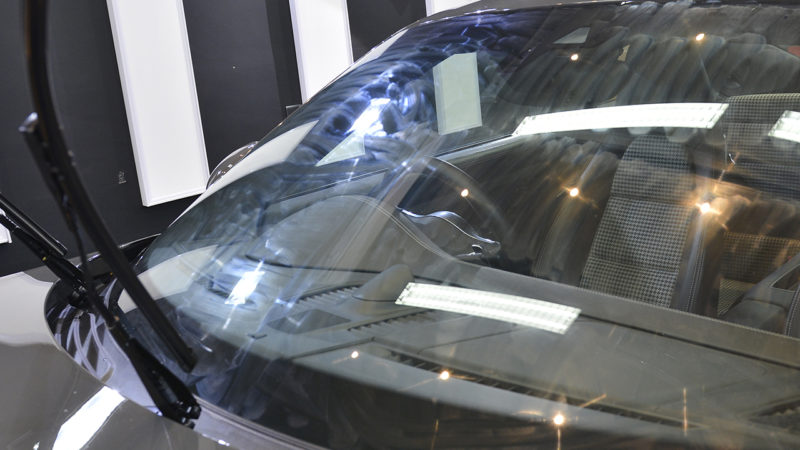 Windscreen and wiper arms of the Porsche 911 cleaned ready for glass treatment