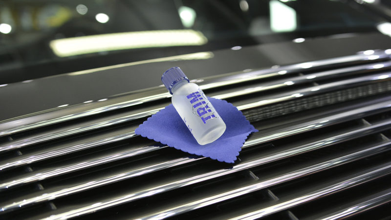 Gyeon Q2 Trim being applied to the engine lid grille of the Porsche 911