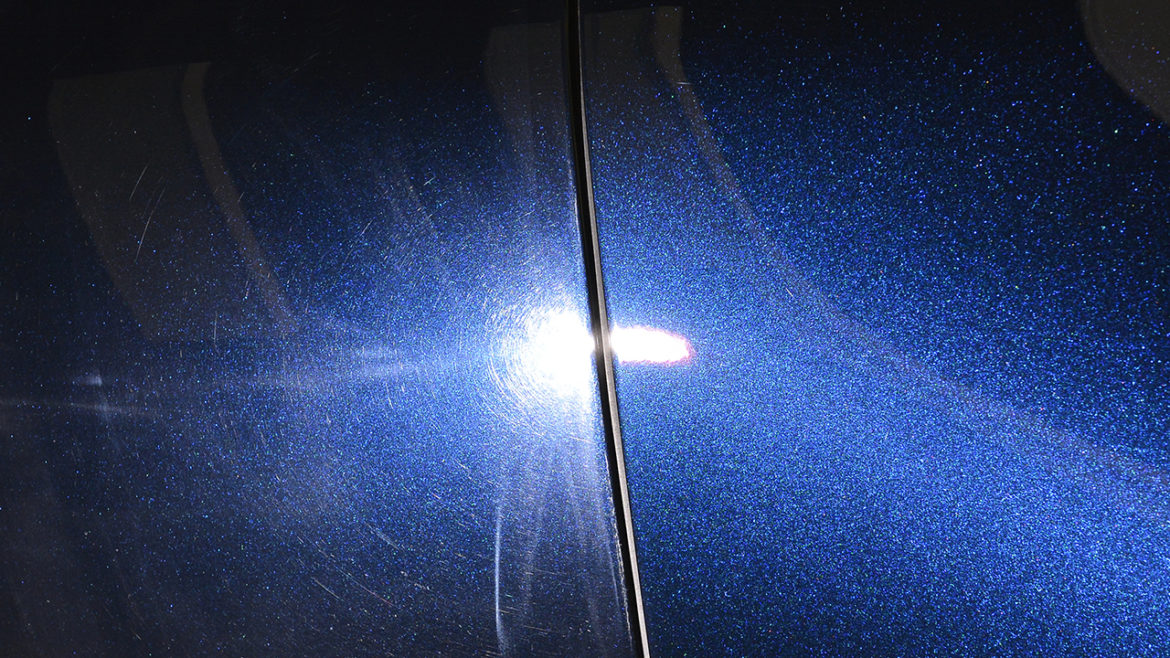 Swirl marks in Aston Martin DB11 paintwork before and after machine polishing