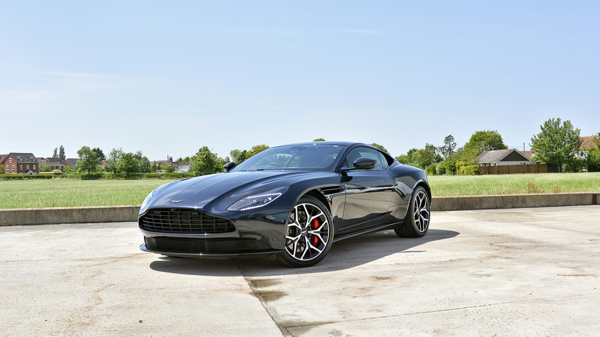 Side profile of the Aston Martin DB11 in daylight after detailing
