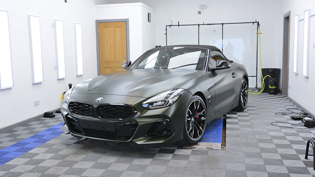 Close-up of a vehicle wrapped with XPEL Stealth paint protection film showing its satin matte finish.