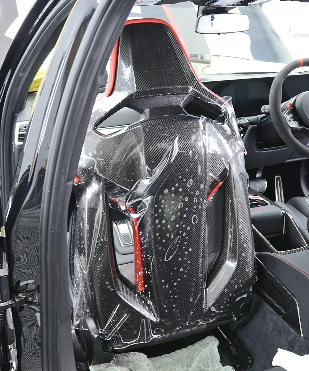 BMW carbon fibre seat backs protected with PPF paint protection film