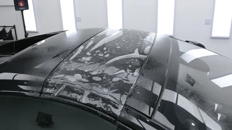 Roof and rear screen surround of the McLaren 600LT during film installation