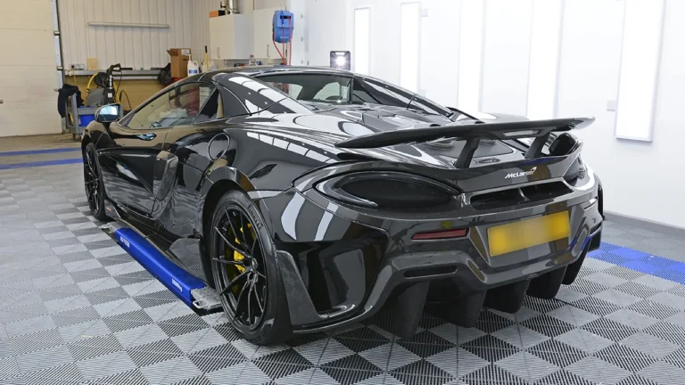 Rear three-quarter of the McLaren 600LT showing the fixed rear wing