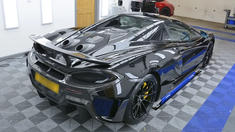 Top-exit exhausts and rear deck of the McLaren 600LT under paint protection film